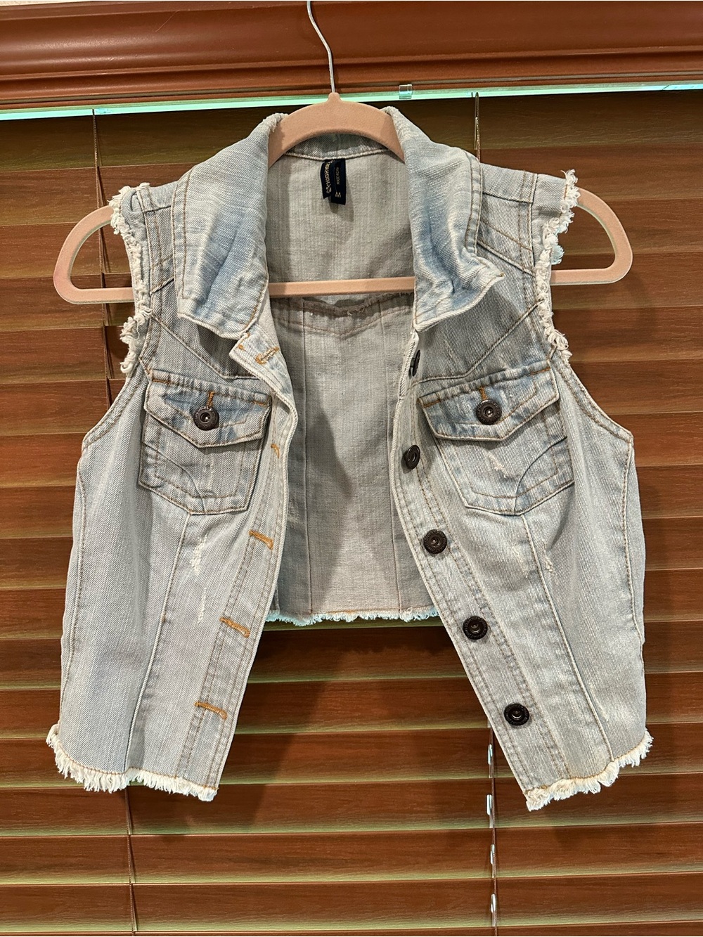 Light Wash Sleeveless Denim Vest with Frayed Trim